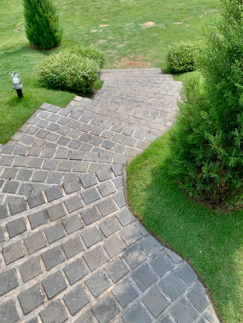 Garden services including lawn, paving and planting work